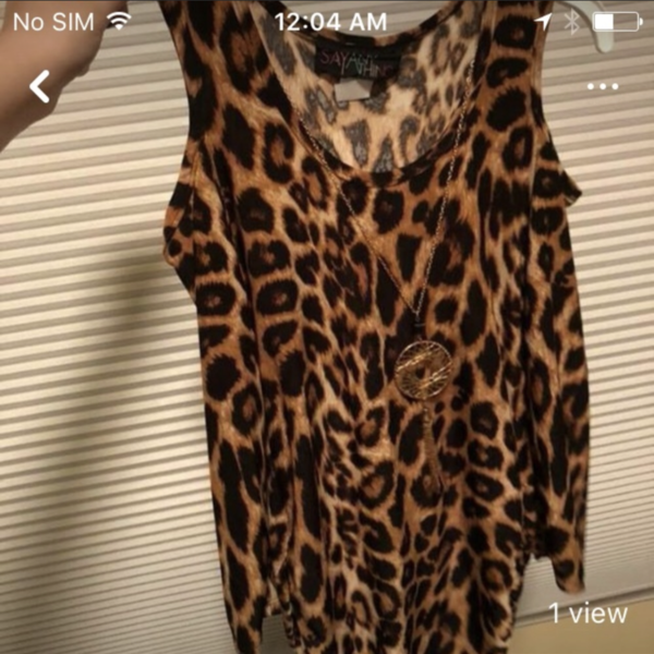 Over the Shoulder Animal Print Top is being swapped online for free