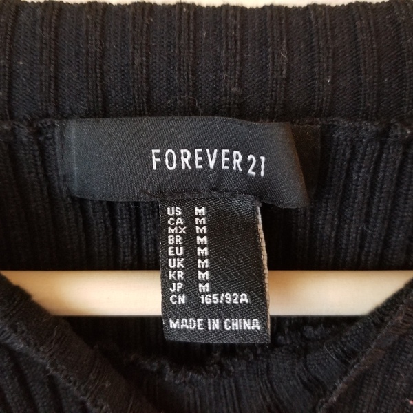 Formfitting Black Off The Shoulder Sweater is being swapped online for free