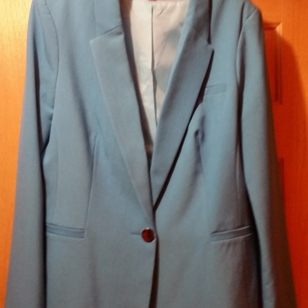 Like new, Long Tall Sally expensive blazer for a size 12 tall girl is being swapped online for free