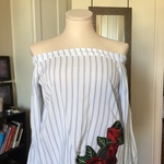 White and Pin Blue Striped Flowy Off the Shoulder Top is being swapped online for free