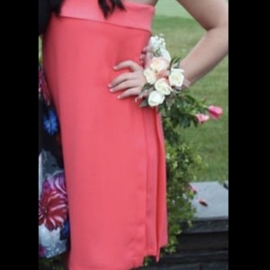 Coral size 4 strapless dress is being swapped online for free