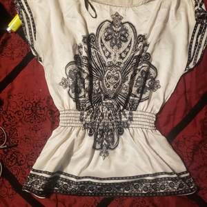 Wet Seal silky top Small is being swapped online for free