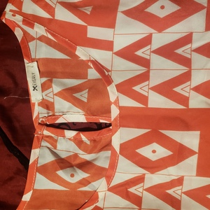 NWOT small/medium geometric blouse is being swapped online for free