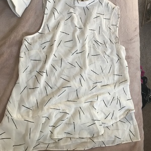 Asymmetrical High Neck Tank Top is being swapped online for free