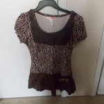 New without tags nice brown and white blouse is being swapped online for free