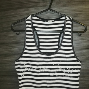 Women's GUESS Stripped T-Shirt  is being swapped online for free