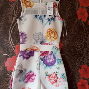 Lovely size 8 never worn with tags playsuit is being swapped online for free