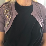 Betsey Johnson Sweater is being swapped online for free