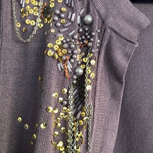 Betsey Johnson Sweater is being swapped online for free