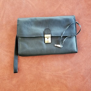 Genuine leather clutch w/key  is being swapped online for free