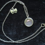 Disney Aristocats Necklace is being swapped online for free