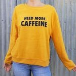 NEED MORE CAFFEINE MUSTARD SWEATER is being swapped online for free