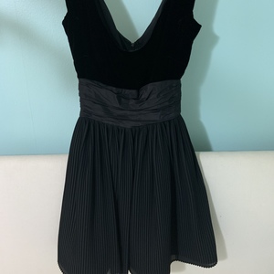 Black Velvet Dress with Pleated Skirt is being swapped online for free