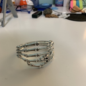 Skeleton Hand Clasping Wrist Bracelet is being swapped online for free