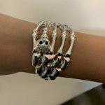 Skeleton Hand Clasping Wrist Bracelet is being swapped online for free