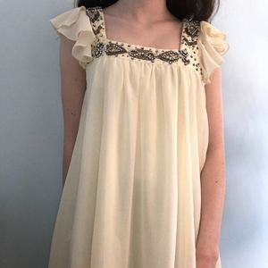 Beaded White Dress is being swapped online for free