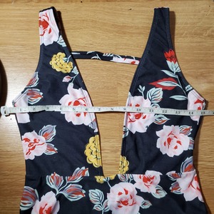 NEW Deep V Plunging Floral Swim Suit Sz S/M is being swapped online for free