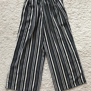 Stripy black and white trousers  is being swapped online for free