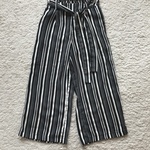 Stripy black and white trousers  is being swapped online for free
