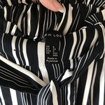 Stripy black and white trousers  is being swapped online for free