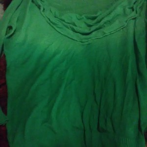 Faded greenish blue long sleeve shirt is being swapped online for free