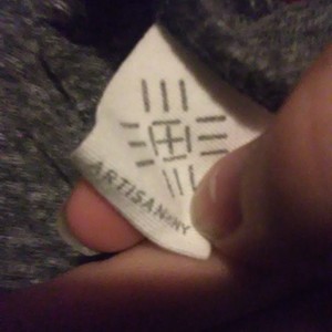 Grey long sleeve shirt is being swapped online for free