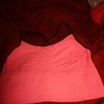 Black and hot pink sports bra is being swapped online for free