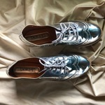 Oxford style shiny shoes is being swapped online for free