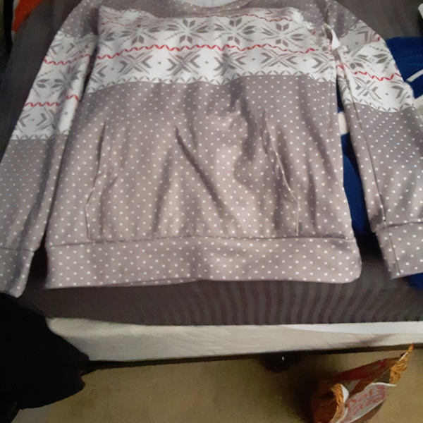A great Xmas sweater.  It's lightweight with a really cute design pattern.  is being swapped online for free