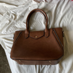 Large brown purse is being swapped online for free