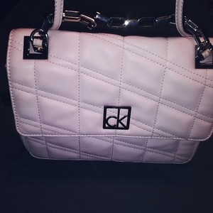 Calvin Klein Kora crossbody Blush Pink RARE is being swapped online for free
