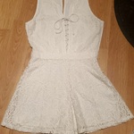 Hollister Floral Lace Up Romper Sz Xs is being swapped online for free