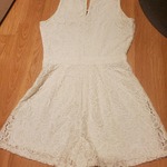 Hollister Floral Lace Up Romper Sz Xs is being swapped online for free