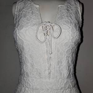 Hollister Floral Lace Up Romper Sz Xs is being swapped online for free