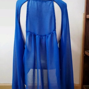 Brandy Melville Long Sleeve Cut Out Back Blouse is being swapped online for free