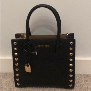  Micheal Kors Leather Mercer Messenger/Hand Bag is being swapped online for free