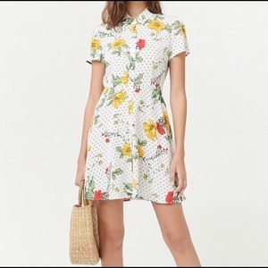 Button-up white floral dress with black dots is being swapped online for free