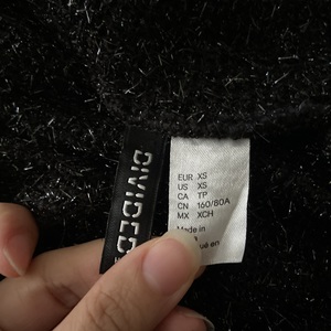 XS Sparkly Turtleneck Crop is being swapped online for free