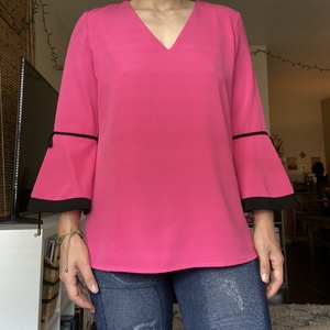 S Calvin Klein Pink VNeck Blouse is being swapped online for free