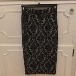 S Black and Gray Patterned Stretchy Skirt is being swapped online for free