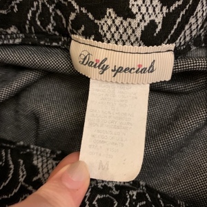 S Black and Gray Patterned Stretchy Skirt is being swapped online for free