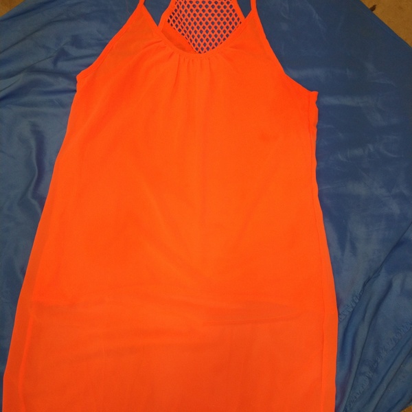 women's bright peach/coral sun dress is being swapped online for free