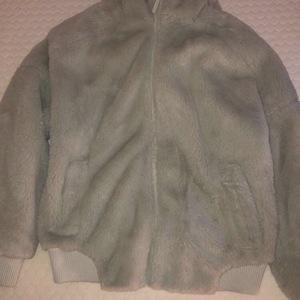 Light Turquoise Fluffy Jacket  is being swapped online for free