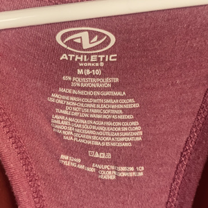 Pink athletic racer back tank top  is being swapped online for free