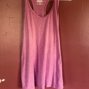 Pink athletic racer back tank top  is being swapped online for free