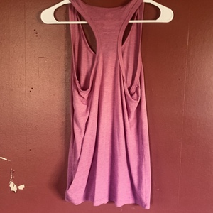 Pink athletic racer back tank top  is being swapped online for free