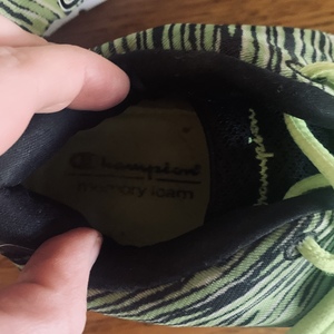 Champion vibrant green athletic shoes  is being swapped online for free