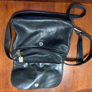 Useful black satchel purse by Tiganello is being swapped online for free