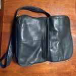 Useful black satchel purse by Tiganello is being swapped online for free