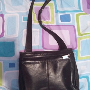 Black Faux Leather messenger bag is being swapped online for free